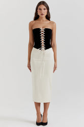 black & vintage cream strapless corset dress